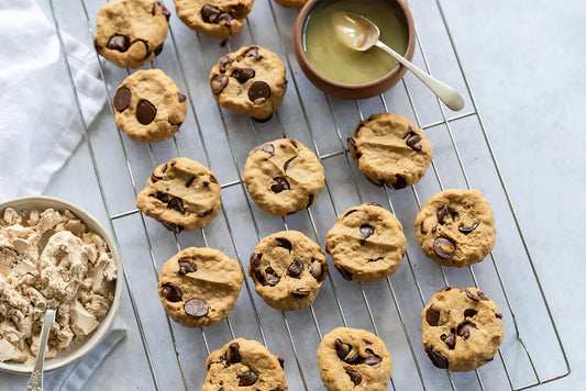 Cookies on a wire rack with honey