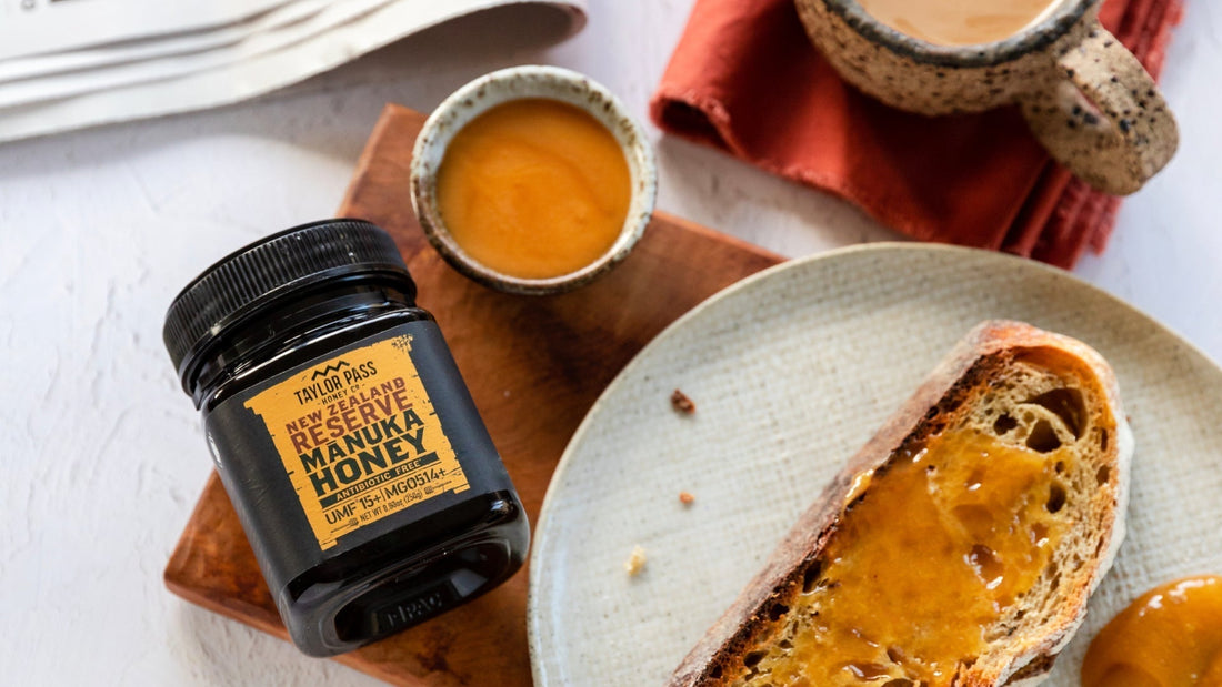 toast with honey and honey jar next to it