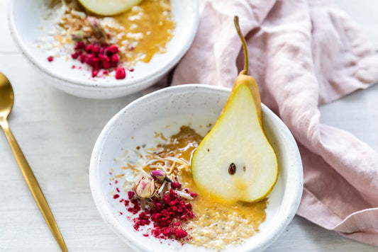 Bowl of porridge with pear and manuka honey